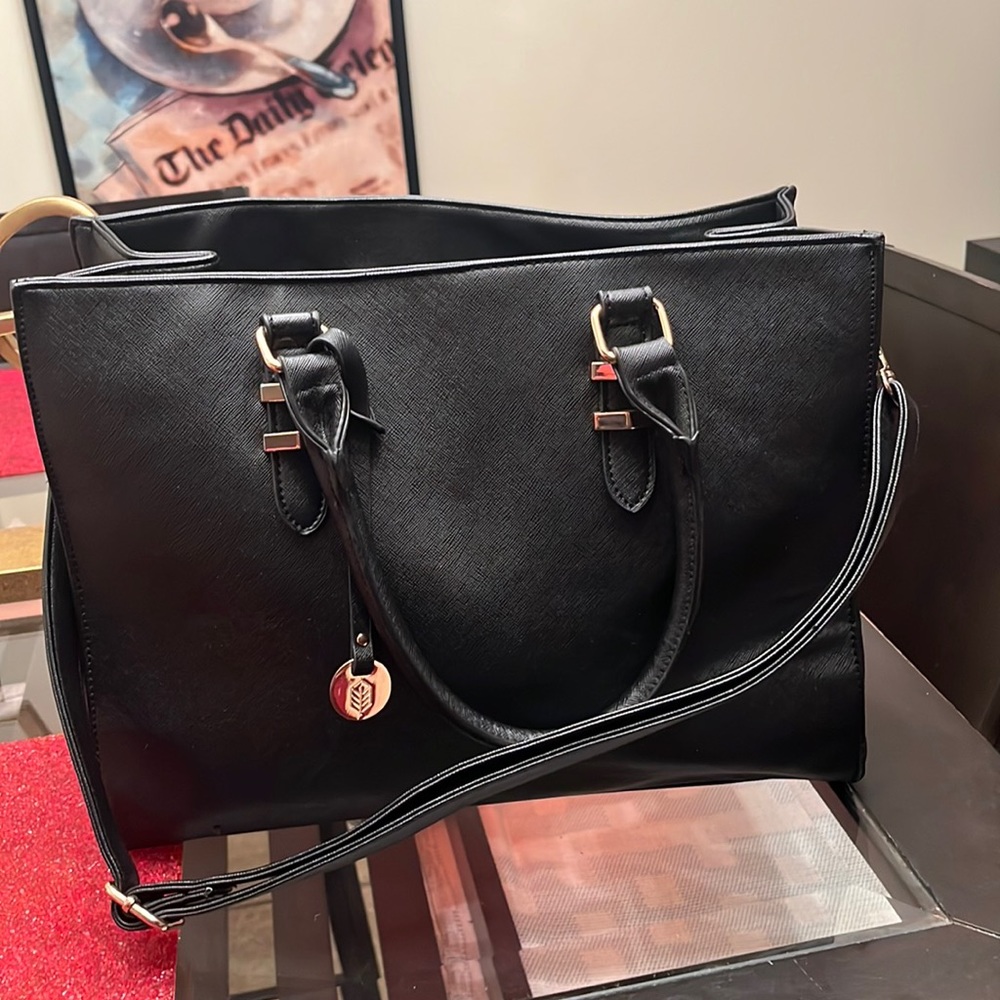 Call it Spring Bag. Perfect for work or dates. Able to hold laptop size.